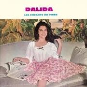 Il testo GARDE-MOI LA DERNIERE DANSE di DALIDA è presente anche nell'album Les enfants du pirée (1960)
