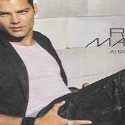 Il testo BESOS DE FUEGO di RICKY MARTIN è presente anche nell'album Almas del silencio (2003)