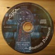 Il testo THIS SHATTERED DAWNBREAK di AURA è presente anche nell'album Shattered dawnbreak (1997)