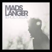 Il testo SHINE di MADS LANGER è presente anche nell'album Fact   fiction. pop   or