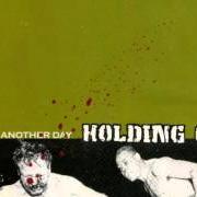 Il testo THE JOKE IS ON US di HOLDING ON è presente anche nell'album Just another day (2001)