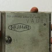 Il testo (CAN'T KEEP AWAY FROM) THE FLAME dei DEF LEPPARD è presente anche nell'album Vault (1995)