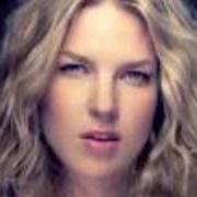 Il testo STOP THIS WORLD di DIANA KRALL è presente anche nell'album The girl in the other room (2004)