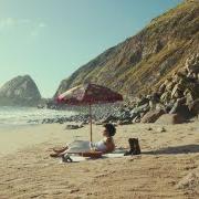 Il testo STARS, STRIPES AND CREDIT CARD SWIPES di LEVEN KALI è presente anche nell'album Lk99 (2026)