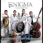 Il testo AUNQUE SEA EN SILENCIO di ENIGMA NORTEÑO è presente anche nell'album Con banda y tololoche (2013)