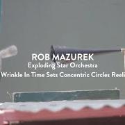 Il testo PARABLE 3000 (WE ALL COME FROM SOMEWHERE ELSE) di ROB MAZUREK è presente anche nell'album Dimensional stardust (2020)