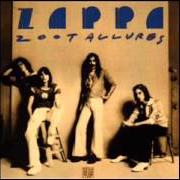 Il testo WIND UP WORKIN' IN A GAS STATION di FRANK ZAPPA è presente anche nell'album Zoot allures (1976)