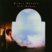 Il testo STANDING RIGHT NEXT TO ME di KARLA BONOFF è presente anche nell'album New world (2000)