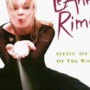 Il testo ROCK ME di LEANN RIMES è presente anche nell'album Sittin' on the top of the world (1998)